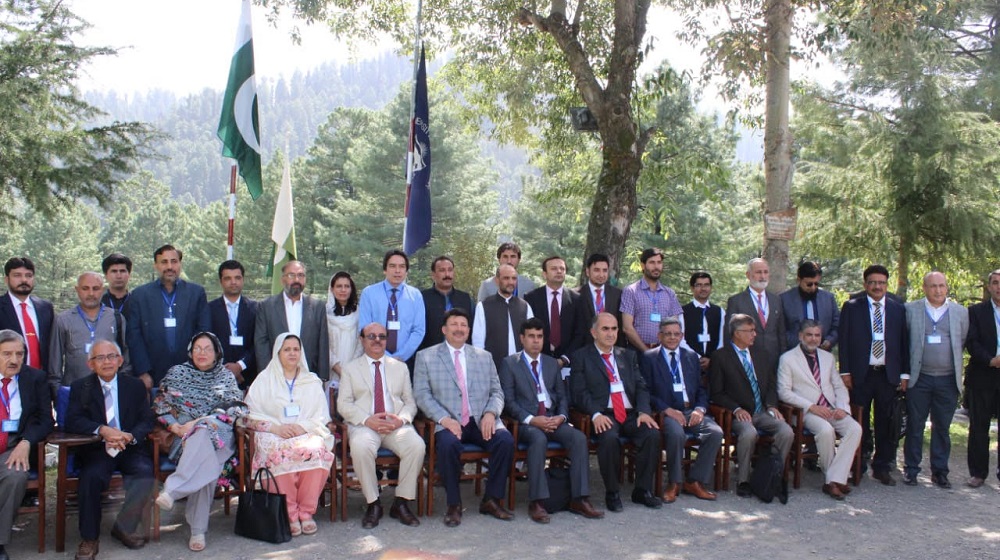The Vice Chancellor University of Peshawar Prof. Dr. Muhammad Asif Khan is sitting along the speakers of the 29th National and 17th International Chemistry conference held between 6-8 September, at Bara Gali Summer Campus